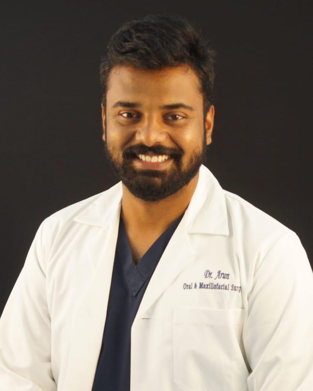 Dr. Arun M